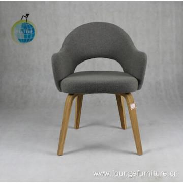 Upholstered chair with wood legs cafe dining style